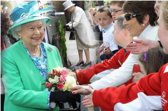 Queen Elizabeth 11 greeting members of the public in Cork City